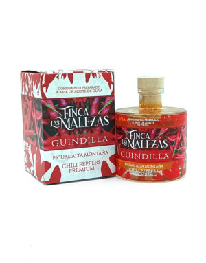 Bottle and box of Finca Las Malezas Guindilla chili pepper oil, Picual Alta Montana – Premium edition.