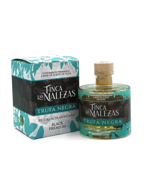 Bottle of Finca Las Malezas Trufa Negra black truffle oil beside its teal and black box.**/placeholder