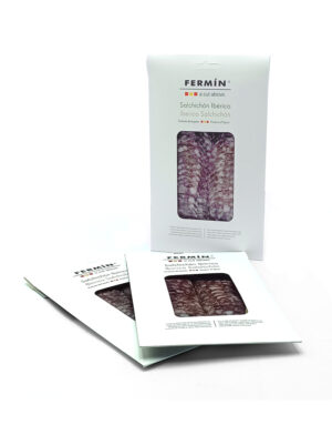 White Fermín packaging for Iberico salchichón with a clear window showing sliced cured meat.