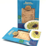 Blue packaging for 'Boquerones en aceite de oliva' by Conservas Emilia, with a transparent window showing light anchovy fillets.