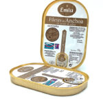 Two Emilia brand tins of anchovy fillets in olive oil, one open showing the label against a white background
