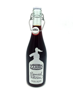 Bottle of Zarro Vermut Especial Taberna with a flip-top closure and white label visible on the dark glass bottle