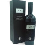 Bottle of IMAZ Gran Reserva 2019 Rioja wine beside its black presentation box, label reading IMAZ and Gran Reserva 2019.
