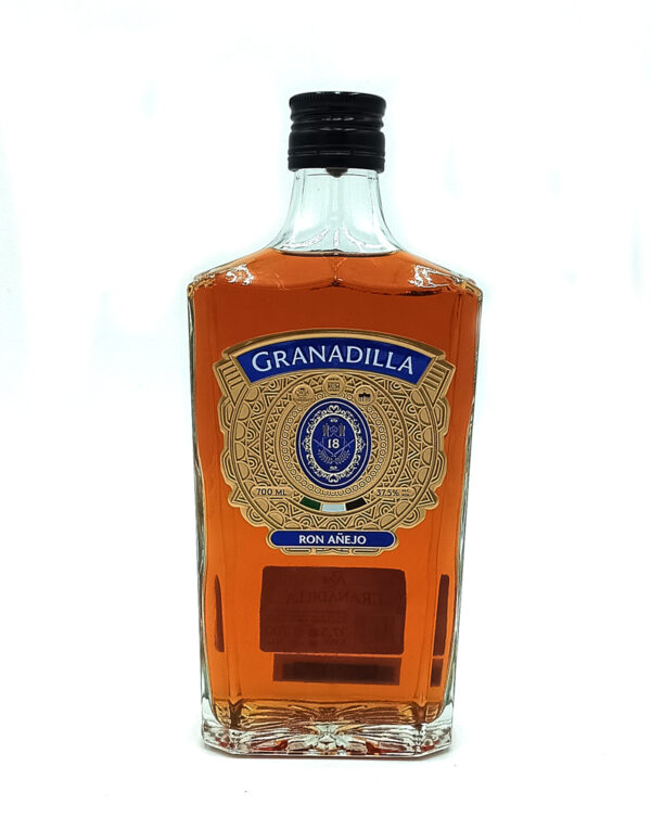1777484624625 - El Gourmext de Casa Chino Bottle of Granadilla Ron Añejo aged rum with an ornate gold label and amber liquid, centered on a white background.