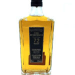 Whiskey bottle with amber spirit and black label reading 'Don Crescencio 72 Meses' on a white background, 700 ml, 40% alc/vol.