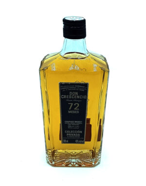 Bottle of Don Crescencio 72 Meses añejo whisky with a black label and amber liquid inside, standing upright on a white background.