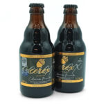 Two dark beer bottles with gold and black labels reading Cerex Brewing Co., 330 ml, 5.2% ABV, Ibérica de Bellota, Cerveza de Extremadura.