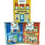 1777484624991 - El Gourmext de Casa Chino Three vintage-style tin boxes shaped like storefronts in yellow, blue, and red with Jules Destrooper branding.
