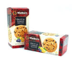 Two Walkers Fruit & Lemon biscuits boxes, one standing and one lying flat, showing cookie image on packaging with fruit accents