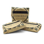 1777484625076 - El Gourmext de Casa Chino Three brown paper-wrapped packages of Zamburiñas en salsa de vieira, labeled Edición Limitada (Limited Edition).