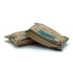 1777484625200 - El Gourmext de Casa Chino Two brown paper-wrapped food packages stacked on a white surface, blue labels visible