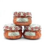 Three glass jars of Aimar Patatas a la Riojana stacked in a pyramid, with red‑and‑white checkered lids against a white background.