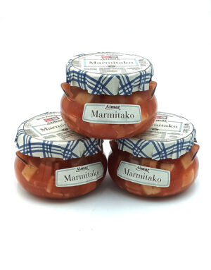 Stack of four Marmitako jars with blue-and-white checkered lids arranged in a pyramid