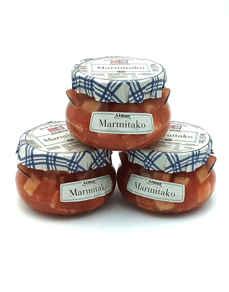 1777484625614 - El Gourmext de Casa Chino Stack of four Marmitako jars with blue-and-white checkered lids arranged in a pyramid