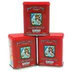 Three red tin cans of Pimentón El Ángel spicy paprika stacked in a pyramid, each with an angel crest label.