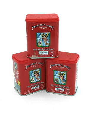 Three red tin cans of Pimentón 'El Ángel' dulce sweet paprika on a white background.