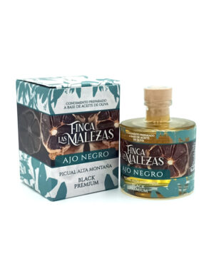 Bottle of Finca Las Malezas Ajo Negro olive oil with its matching box on a white background