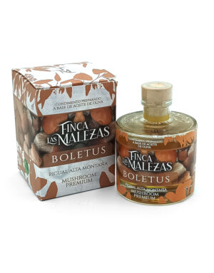 Bottle and box labeled 'Finca Las Malezas Boletus'—Picual Alta Montana Mushroom Premium, a mushroom oil condiment set beside each other.