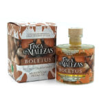 Boletus mushroom premium oil set in a box and bottle labeled Finca Las Malezas, olive oil base product packaging