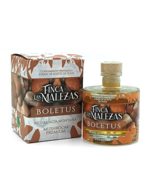 Boletus mushroom premium oil set in a box and bottle labeled Finca Las Malezas, olive oil base product packaging