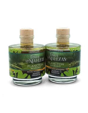 Two glass bottles of Plancton Marino olive oil with beige caps, standing side by side on a white background.