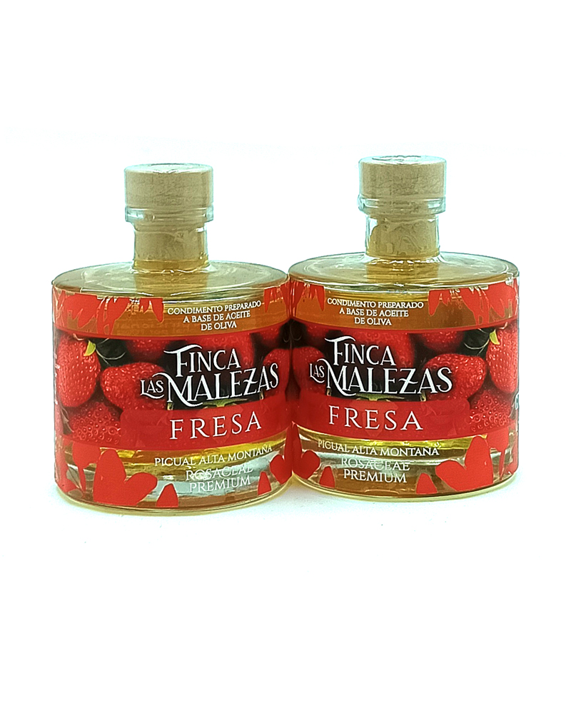 1776794962879 - El Gourmext de Casa Chino Two glass bottles labeled Finca Las Malezas Fresa premium strawberry olive oil, standing side by side on a white background with cork stoppers.