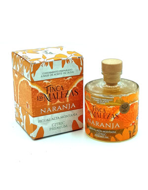 Orange-flavored olive oil product box and bottle labeled Finca Las Malesas Naranja with citrus artwork on white background (ready-to-use condiment).