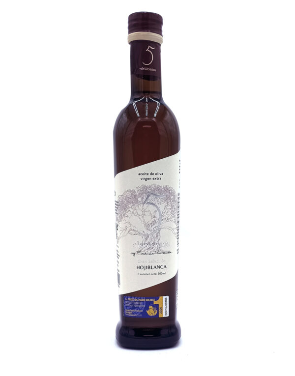Bottle of extra virgin olive oil with a cream label and an illustration of an olive tree, tall dark glass with purple cap.