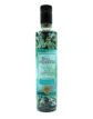 Bottle of Finca Las Malézas extra virgin olive oil with teal label and botanical design; reads 'Primer Día de Cosecha' and 'Alta Montaña' on the label.