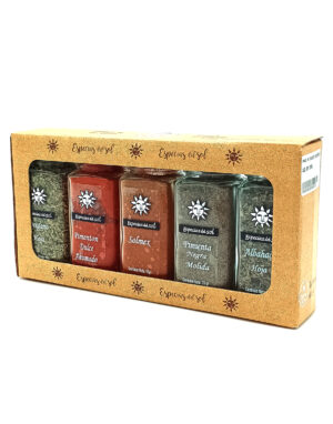 1776794963303 - El Gourmext de Casa Chino Box of six glass spice jars in a brown windowed package, brand Especias del Sol with sun logos visible.