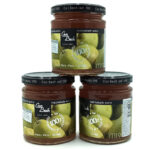 1778794818317 - El Gourmext de Casa Chino Three jars of pear jam arranged in a triangle, Can Bech labels visible on white background.