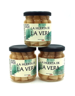 1778794819055 - El Gourmext de Casa Chino Three jars of La Huerta de La Vera pickled asparagus stacked on a white background with black lids and green labels.