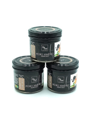 1778794819096 - El Gourmext de Casa Chino Three black jars labeled Pedro Ximénez Gelificado are stacked in a pyramid on a white background.