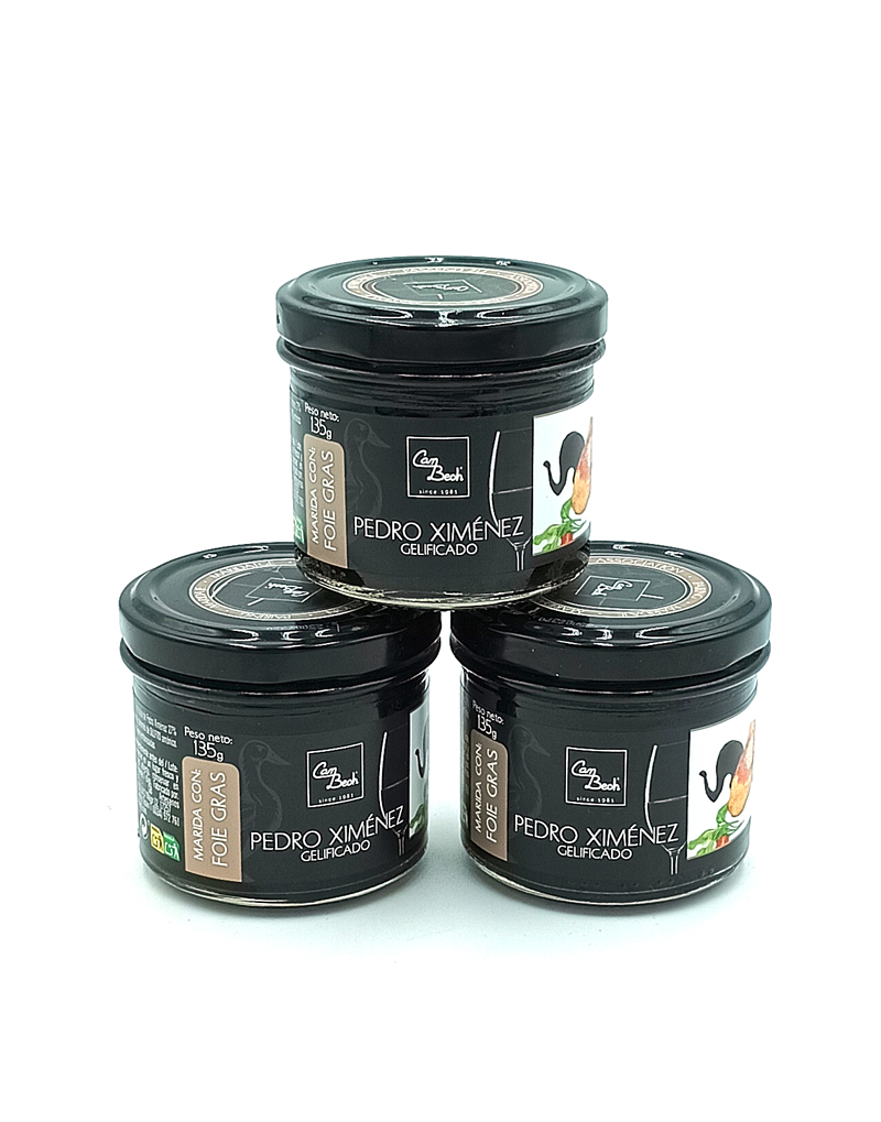 1778794819096 - El Gourmext de Casa Chino Three black jars labeled Pedro Ximénez Gelificado are stacked in a pyramid on a white background.