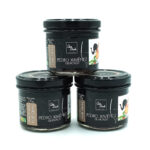 1778794819159 - El Gourmext de Casa Chino Three black-lidded jars labeled Pedro Ximénez Gelificado, foie gras flavor, stacked in a triangular arrangement against a white background.