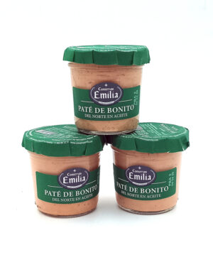 1778794819744 - El Gourmext de Casa Chino Three jars of Emilia Conservas Paté de Bonito del Norte en aceite stacked in a pyramid on a white background