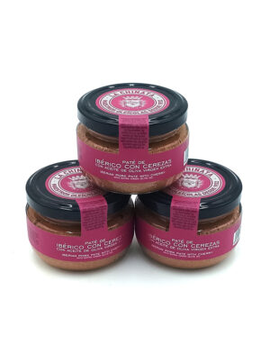 1778794819939 - El Gourmext de Casa Chino Three jars of ibérico pork pâté with cherry, pink labels, and black lids stacked on a white background.