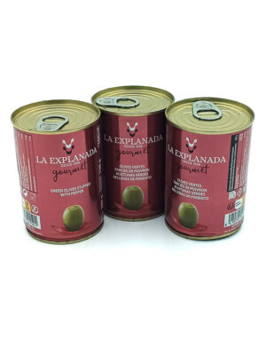 1778794820096 - El Gourmext de Casa Chino Three red La Explanada Gourmet cans of green olives stuffed with pepper displayed together against a white background.