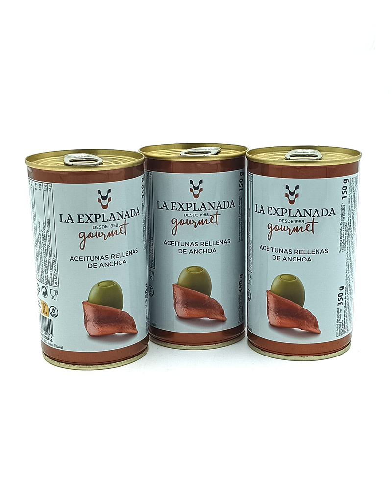 1778794820153 - El Gourmext de Casa Chino Three cans of La Explanada gourmet anchovy-stuffed olives lined up on a white background, labels show the brand and product description.