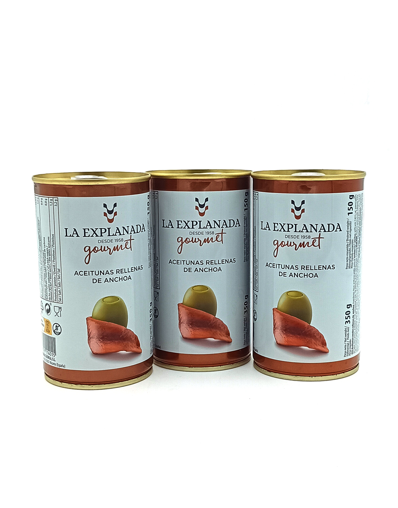 1778794820162 - El Gourmext de Casa Chino Three La Explanada Gourmet stuffed anchovy olives cans arranged in a row on a white background.
