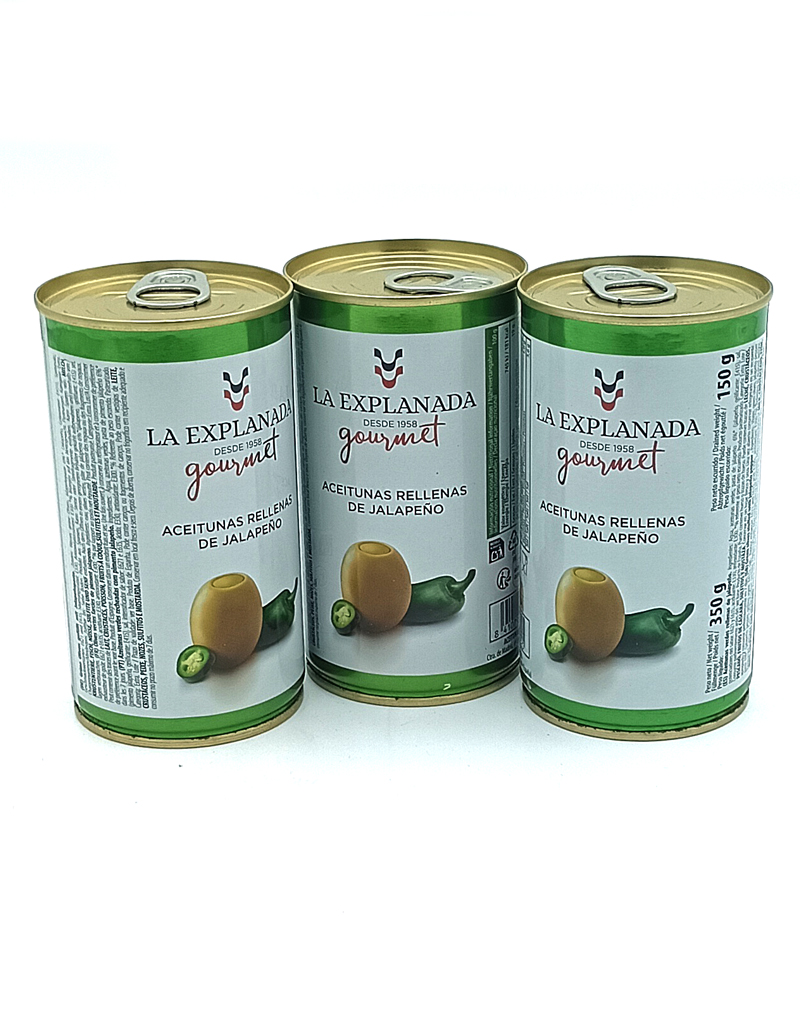 1778794820244 - El Gourmext de Casa Chino Three cans of La Explanada Gourmet jalapeño-stuffed olives arranged in a row with white labels and green bands.