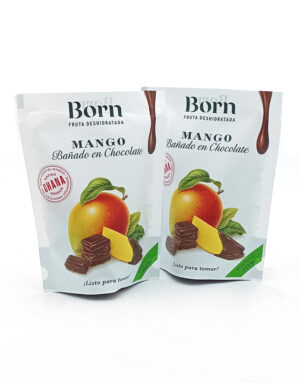 1778794820736 - El Gourmext de Casa Chino Two white pouches of Born Mango Bañado en Chocolate, mango and chocolate pieces illustrated, packaging showing 'Fruta Deshidratada' and green label highlights.