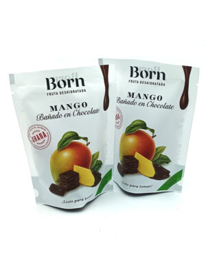 1778794820744 - El Gourmext de Casa Chino Two white packaging pouches for Born Mango Bañado en Chocolate, featuring a mango, chocolate pieces and green leaves.